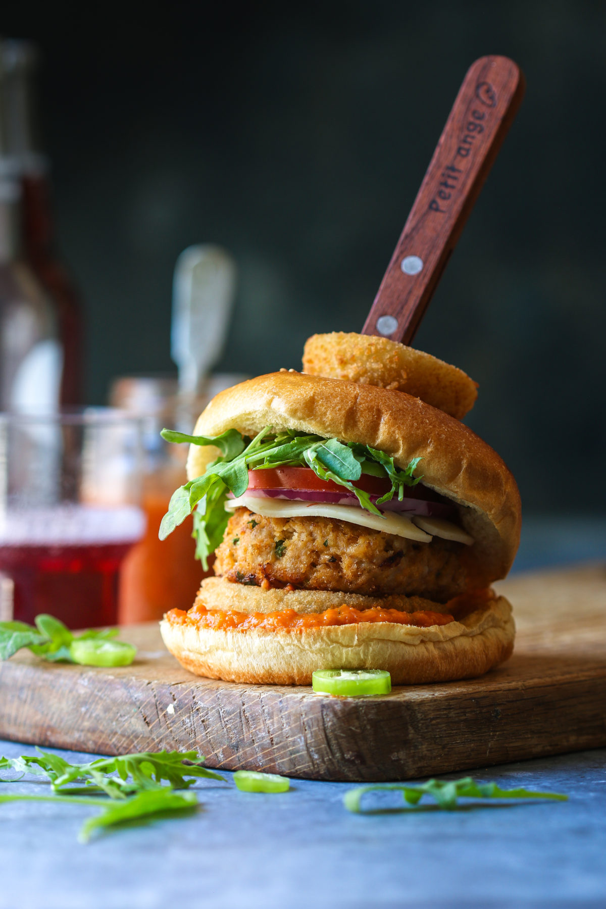 Peach Habanero Chicken Burger with Melted Provolone and Onion Rings